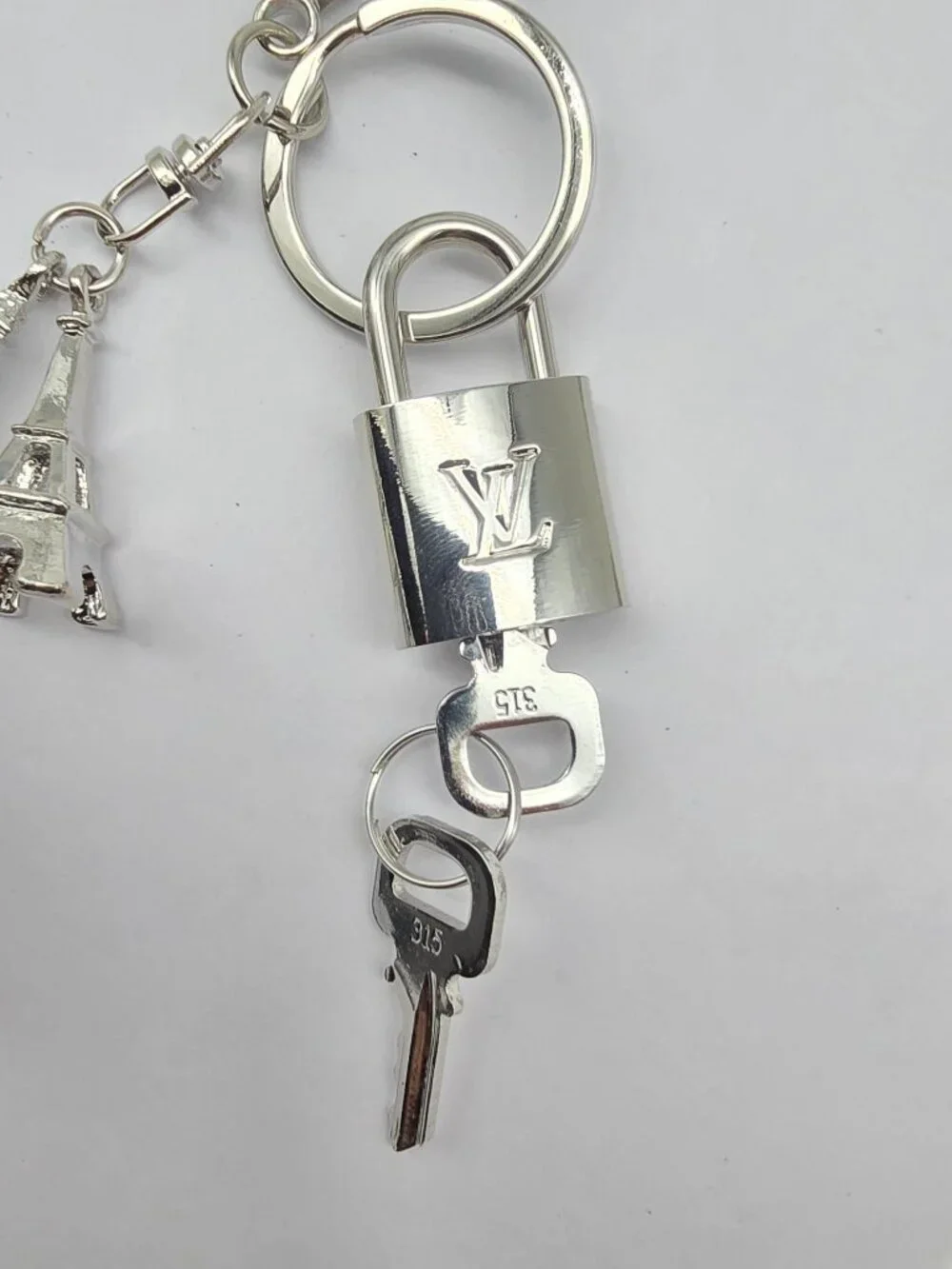 Authentic Louis Vuitton Silver Lock 🔒 Unbranded Eiffel Tower Keychain